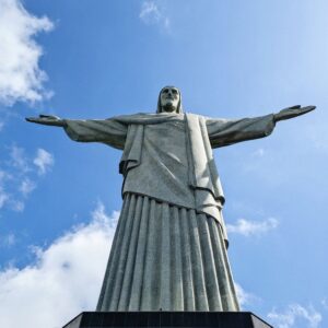 Cristo Redentor sob céu azul — Rio Sunset, Jogos da FENAE 2026